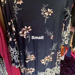 Size Small tops and dresses, never been worn